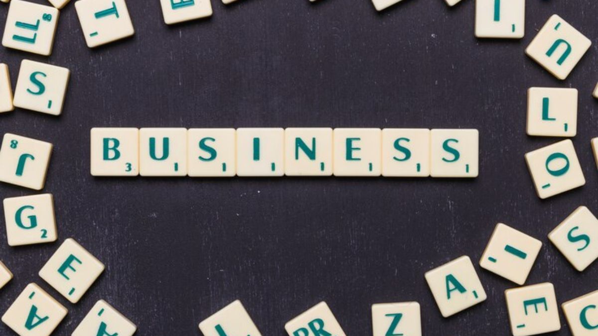 Unpretentious Business Crossword Clue